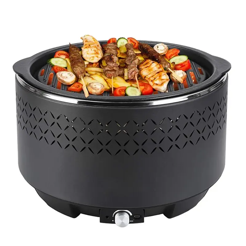 باربیکیو و گریل رومیزی فن دار فمور همراه با غذا روی صفحه گریل